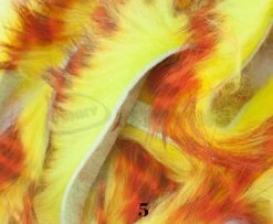 Hareline Tiger Barred Rabbit Zonker Strips - Funky Fly Tying 33 Hareline Tiger Barred Rabbit Zonker Strips - Funky Fly Tying -Fishing Accessories Store Hareline Magnum Cut Tiger Barred Zonkers Orange Black over Fl Yellow 3