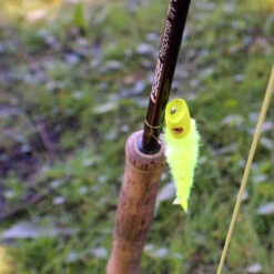 Flymen Surface Suducer Howitzer Baitfish Poper Head - Funky Fly Tying -Fishing Accessories Store Howitzer yellow chartreuse on fly rod